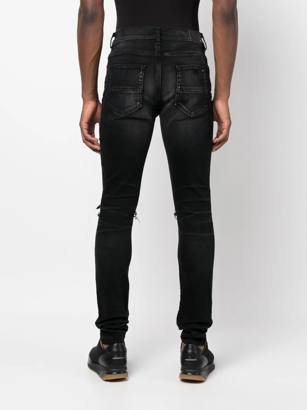 AMIRI distressed skinny-cut jeans